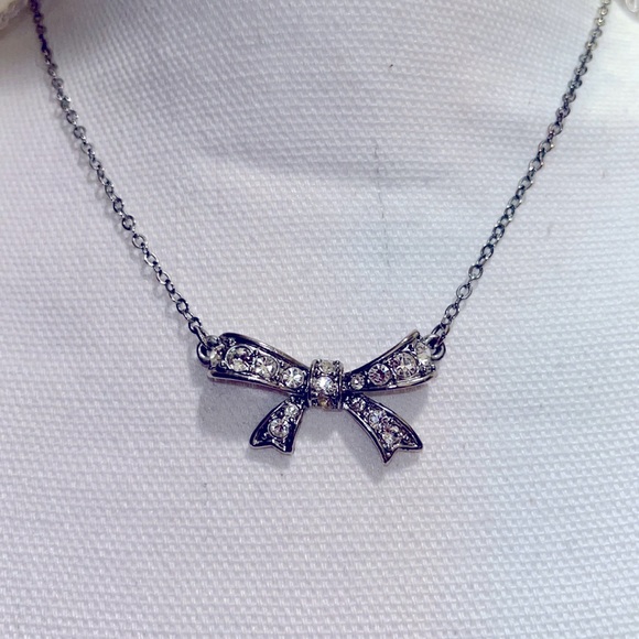American Eagle Outfitters silvertone necklace with CZ stones in bow - Picture 2 of 4
